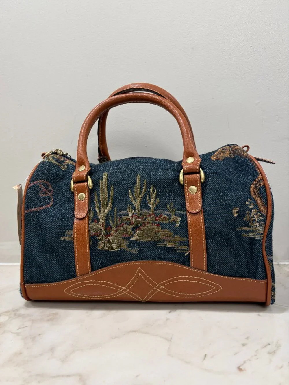 Denim and leather handbag with Southwestern Design